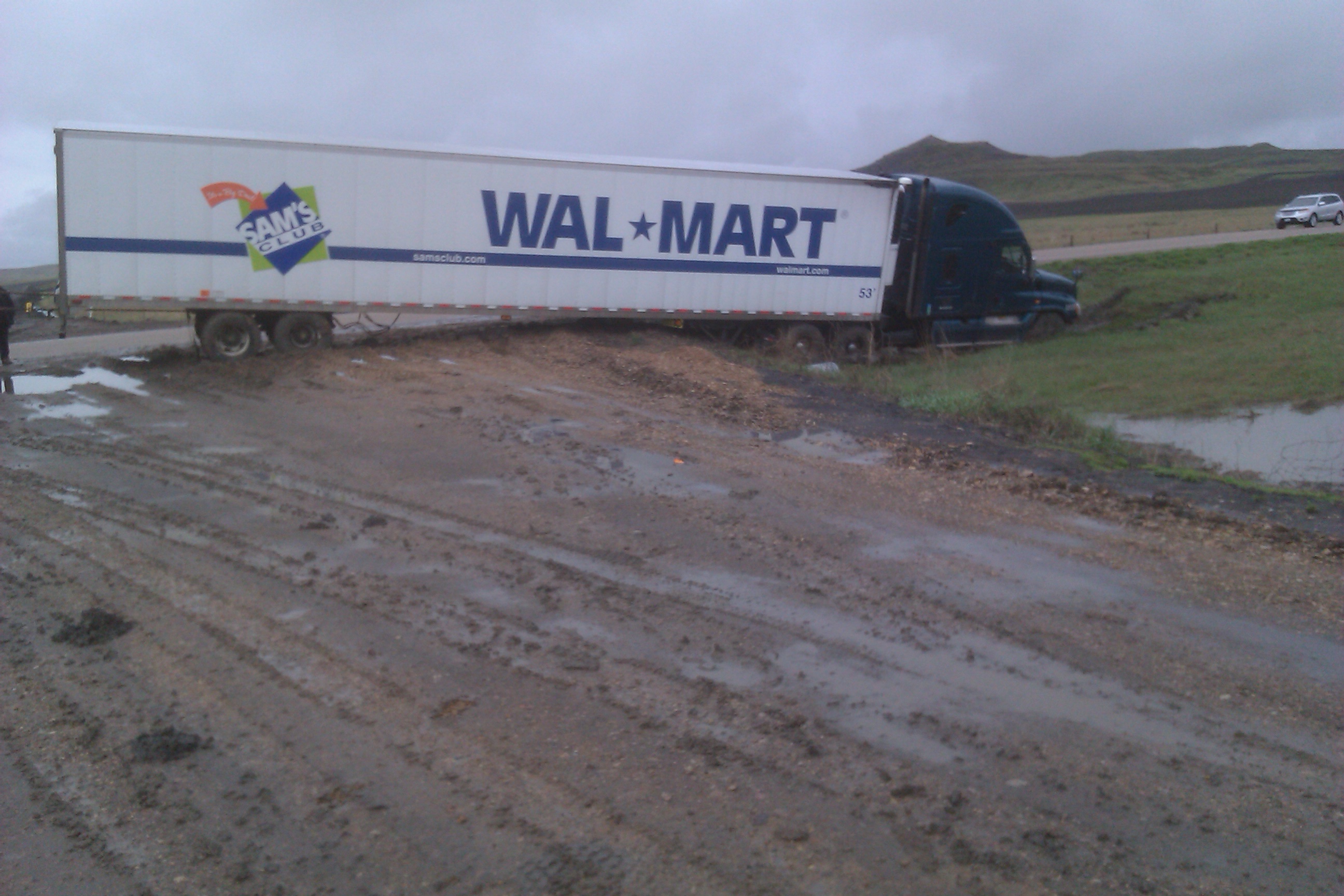 This semi loaded with food needed help getting back between the lines west of Alzada. 




