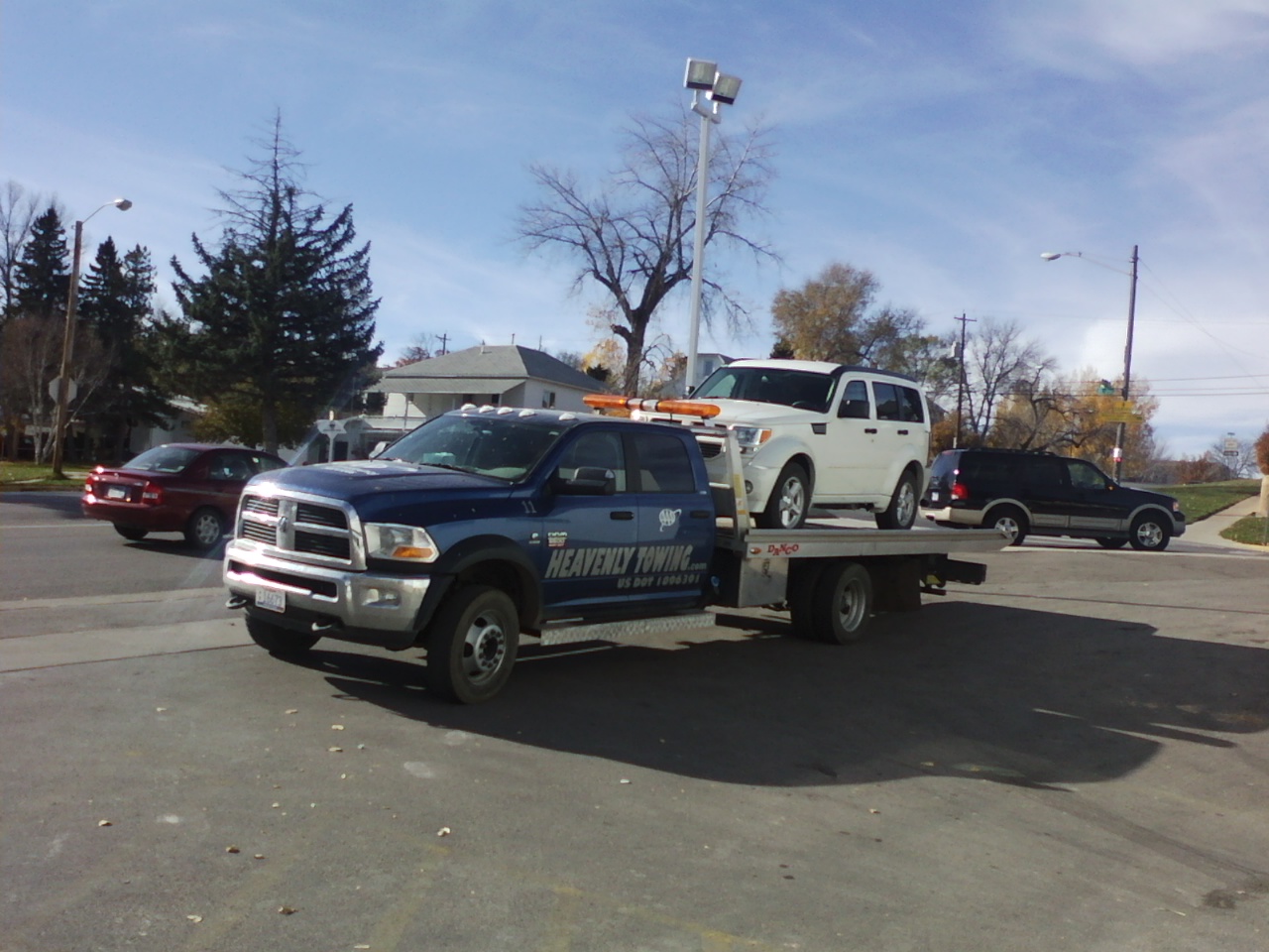 A dodge being taken to the dodge dealer ( Juneks ) 




