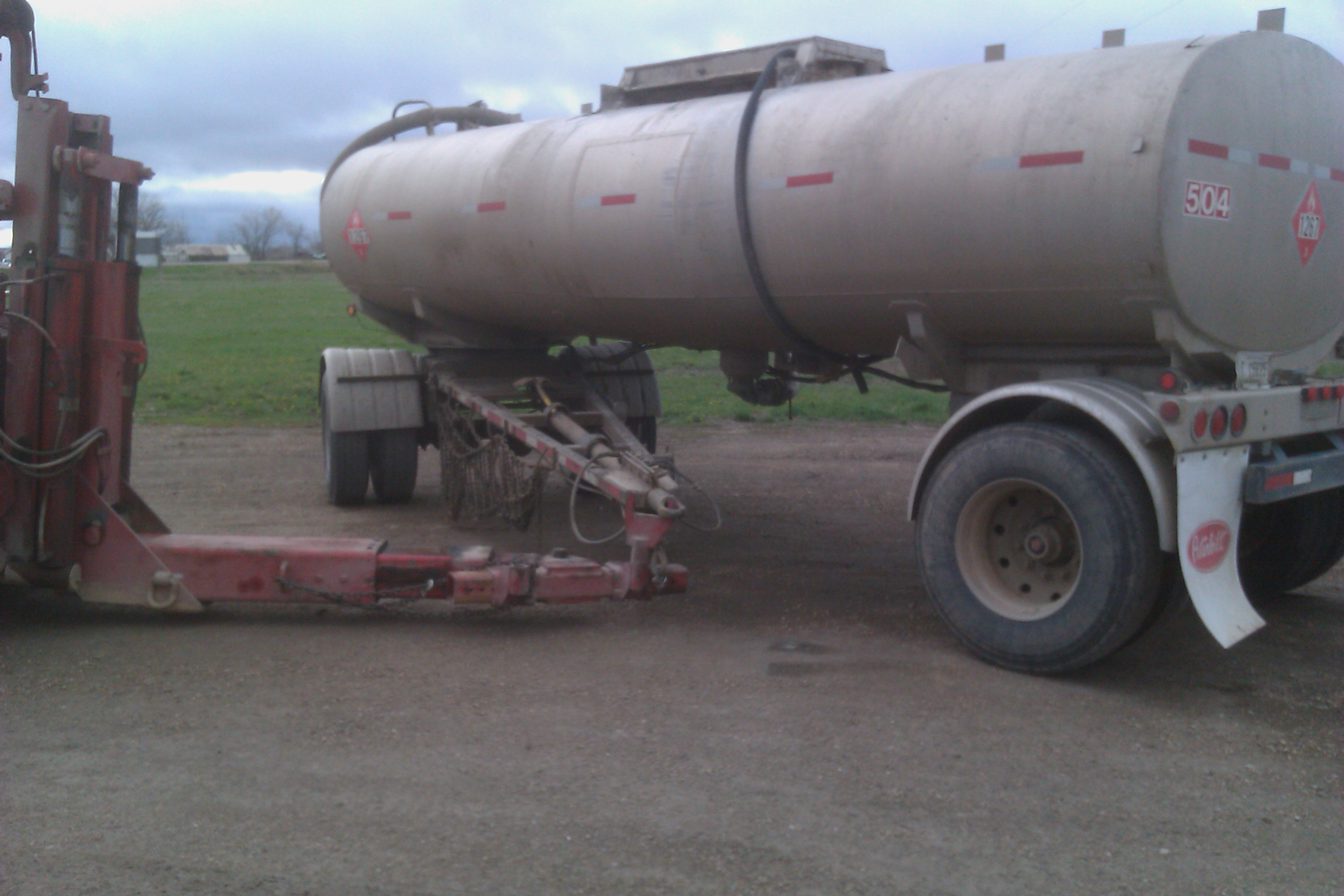 Proper hook up for swinging the tongue under the tanker belly for storage ( being careful of the tanker valve ).