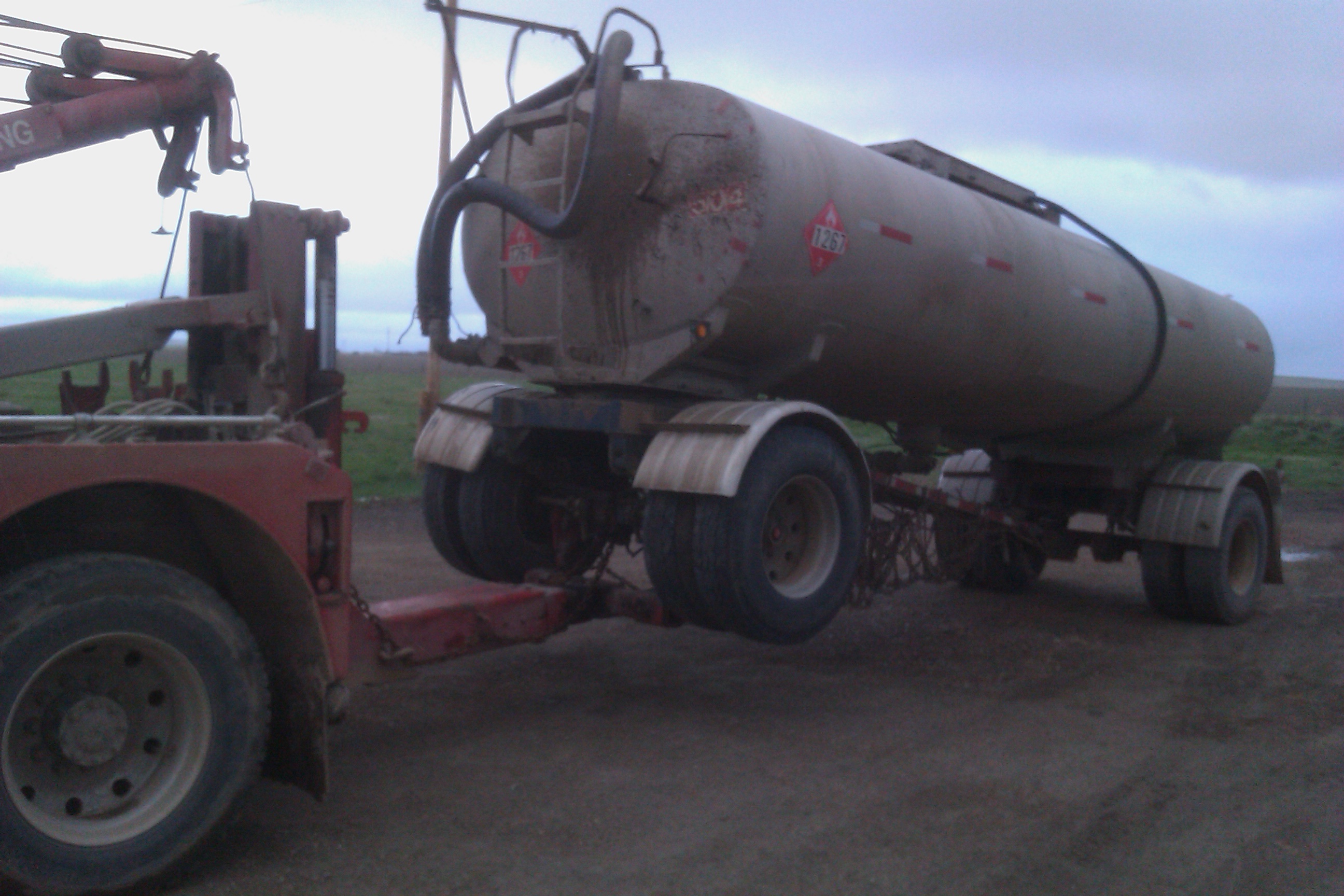 Proper hook up under the axle of a tanker pup for transport.