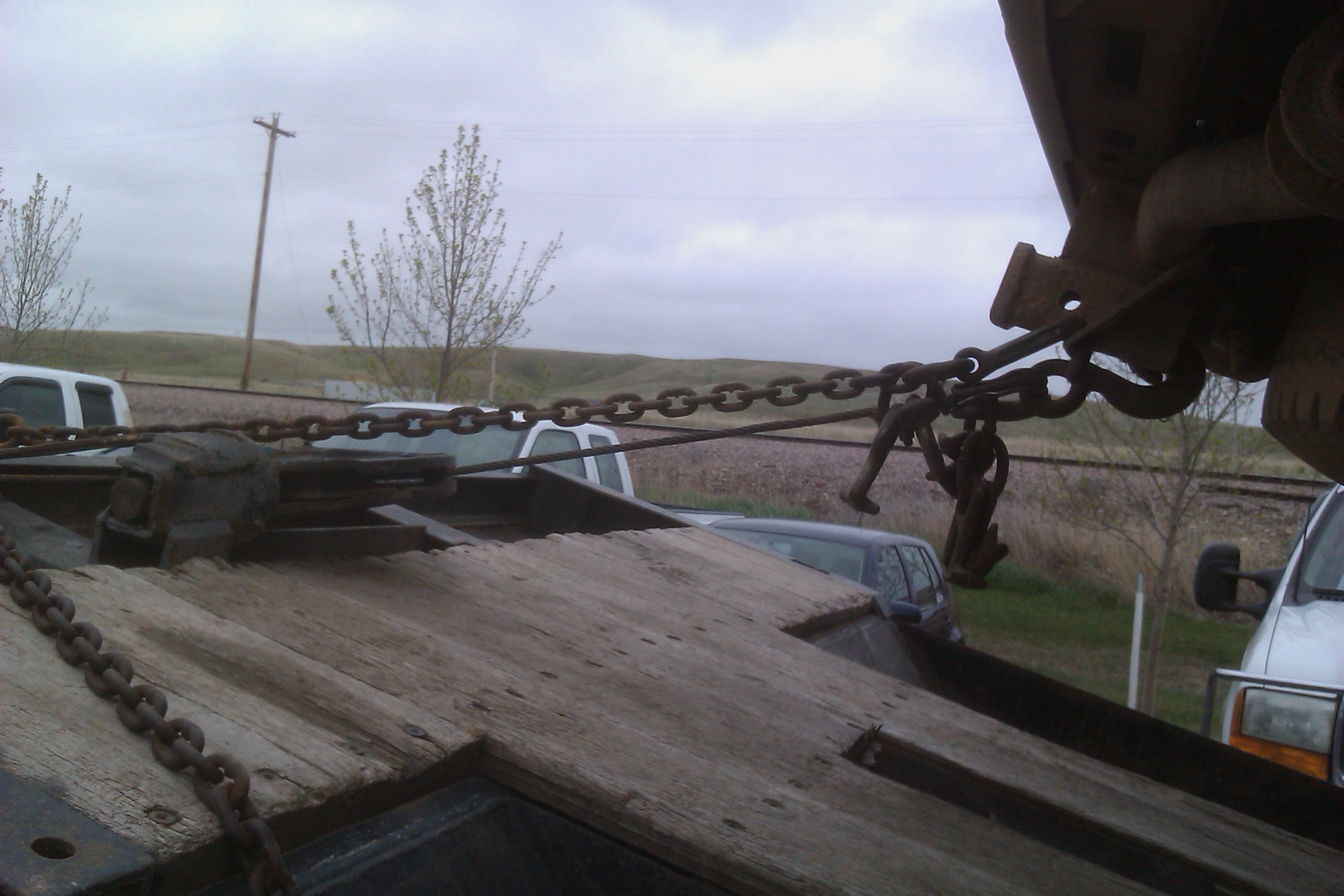 Proper use of safety chain in conjuction with winch cable ( which cannot be considered a safety by federal regulations ).
