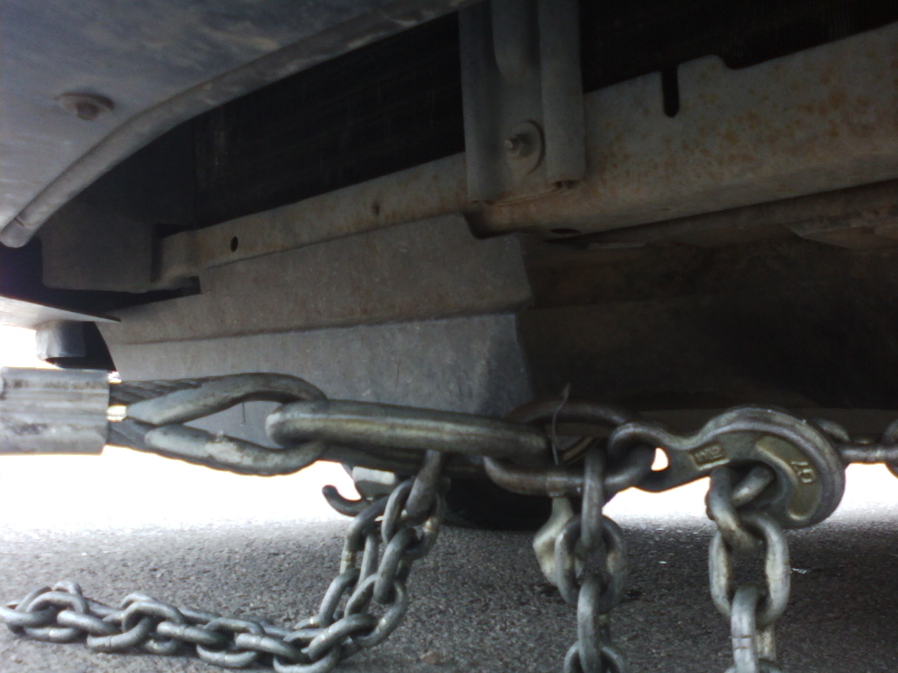 To shorten a chain using the hooks on a V-chain.